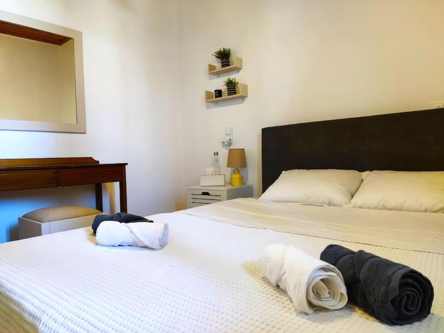 Postel nebo postele na pokoji v ubytování Seaside Escape Apartment