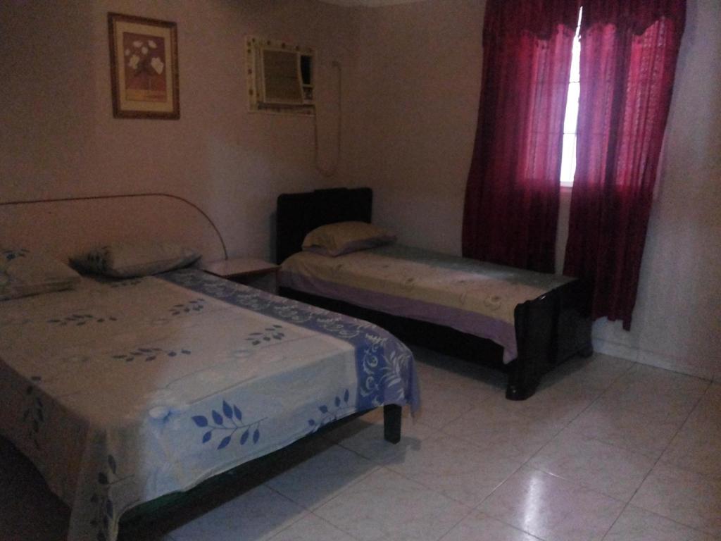 Postel nebo postele na pokoji v ubytování Residencial Turistico Cuba