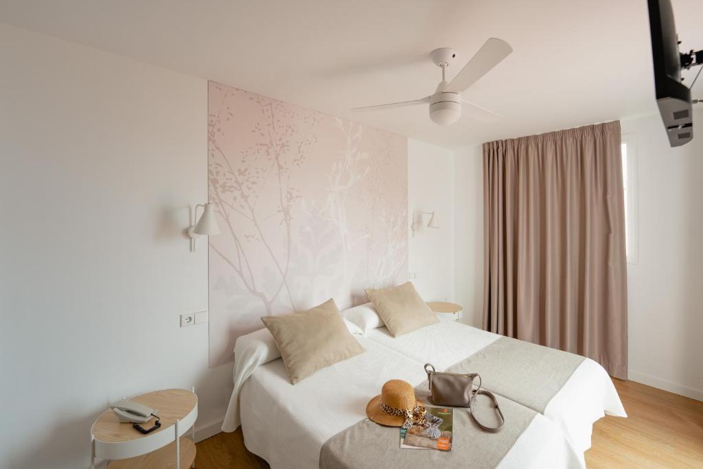 Postel nebo postele na pokoji v ubytování Hotel Internacional