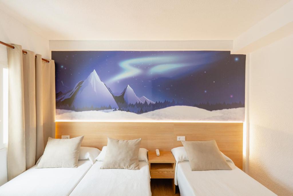 Postel nebo postele na pokoji v ubytování Hotel Internacional