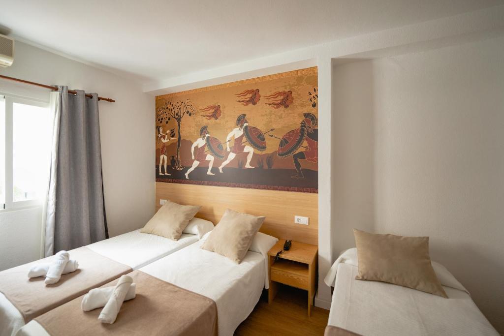 Postel nebo postele na pokoji v ubytování Hotel Internacional
