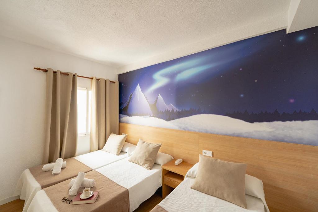 Postel nebo postele na pokoji v ubytování Hotel Internacional