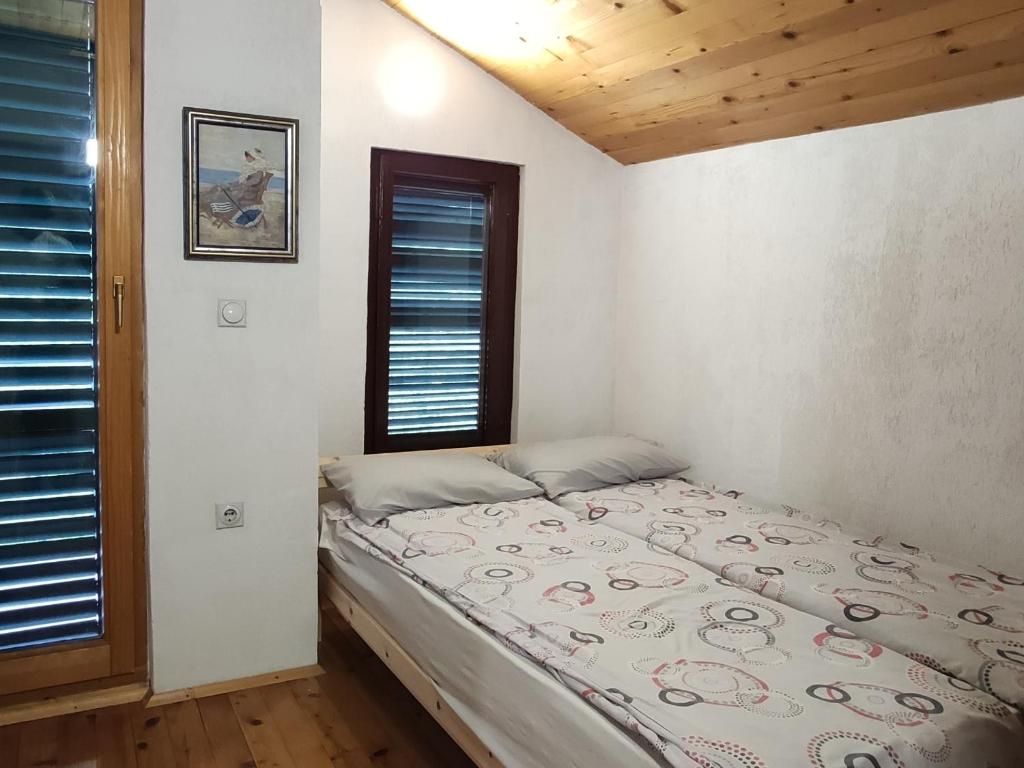 Postel nebo postele na pokoji v ubytování Jovanov Residence - Remote & Accessible
