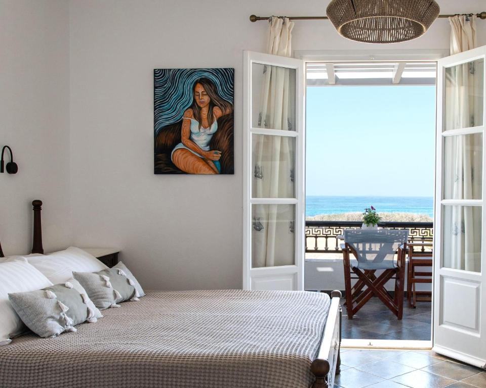 Postel nebo postele na pokoji v ubytování Sea Lilies Suites