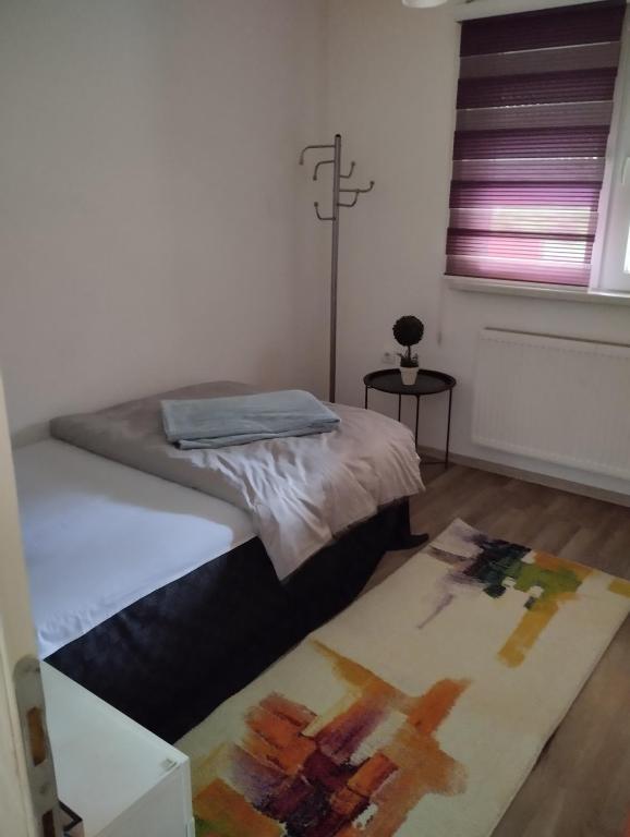 Ліжко або ліжка в номері Apartman All seasons