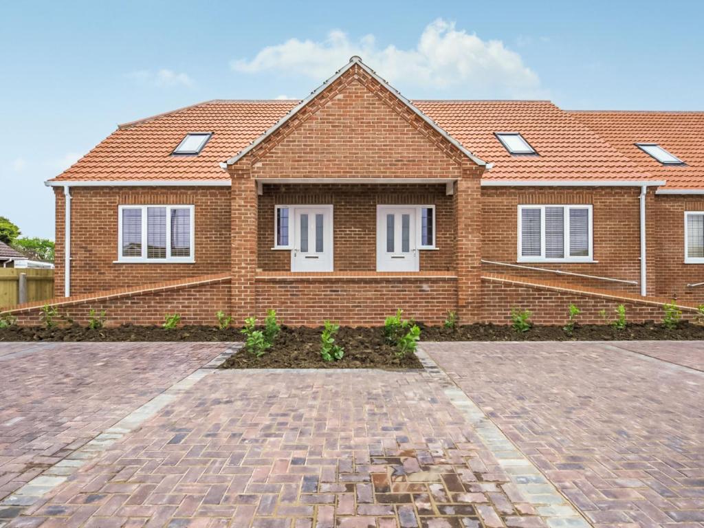 a brick house with a brick driveway at 3 Dawson Court - Uk33415 in Mablethorpe