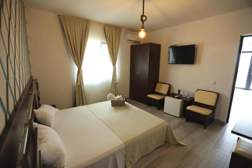 Postel nebo postele na pokoji v ubytování Casa Izabela