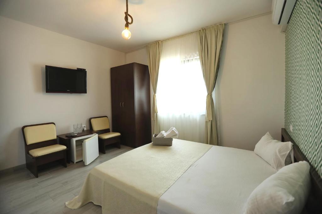 Postel nebo postele na pokoji v ubytování Casa Izabela
