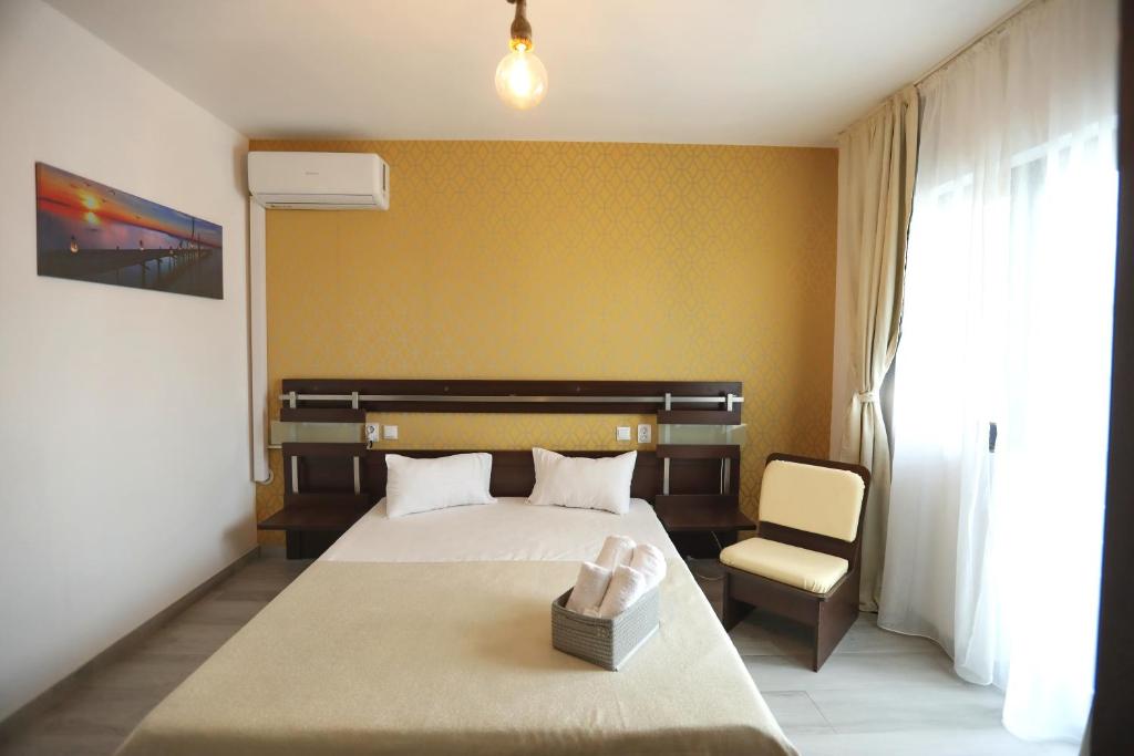 Postel nebo postele na pokoji v ubytování Casa Izabela