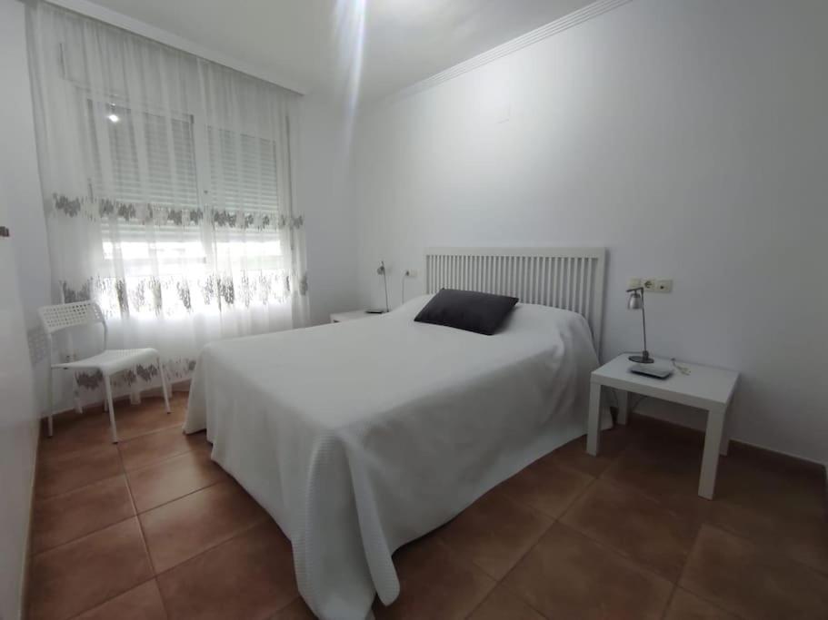 Postel nebo postele na pokoji v ubytování Casa Lilia con piscina y garaje