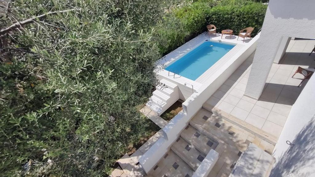Бассейн в Pool Seaside Relais - VILLE Ninfea, Marea, Rosa e Cassiopea или поблизости