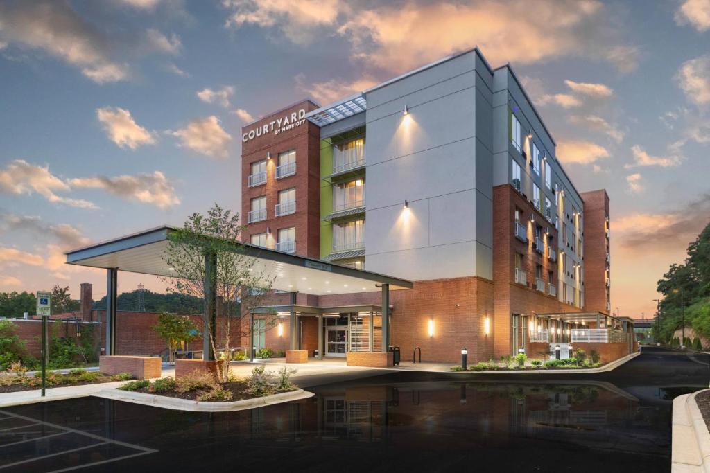 a rendering of a hotel with a building at Courtyard Asheville Biltmore Village in Asheville