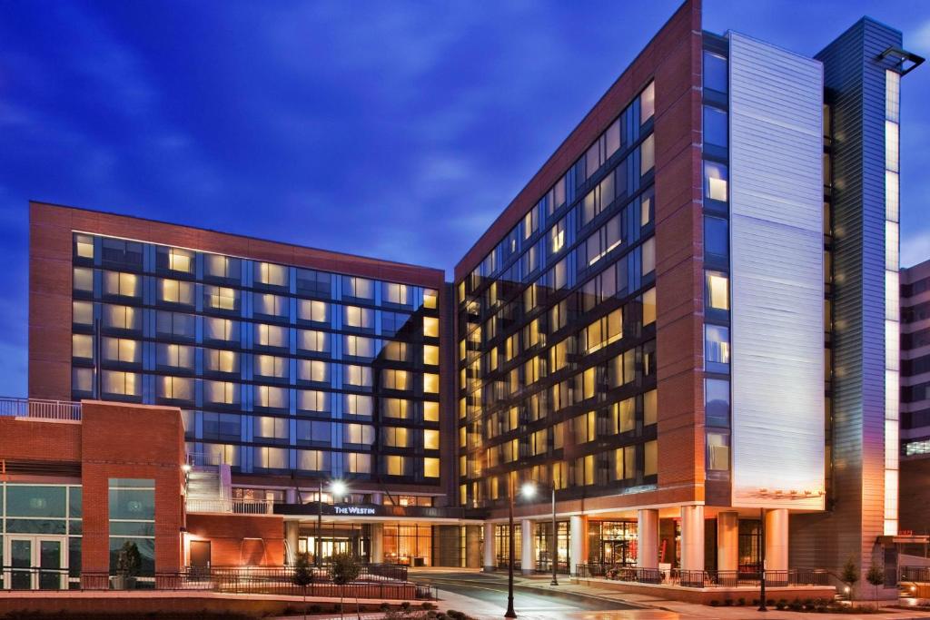 a rendering of a hotel building at night at The Westin Birmingham in Birmingham