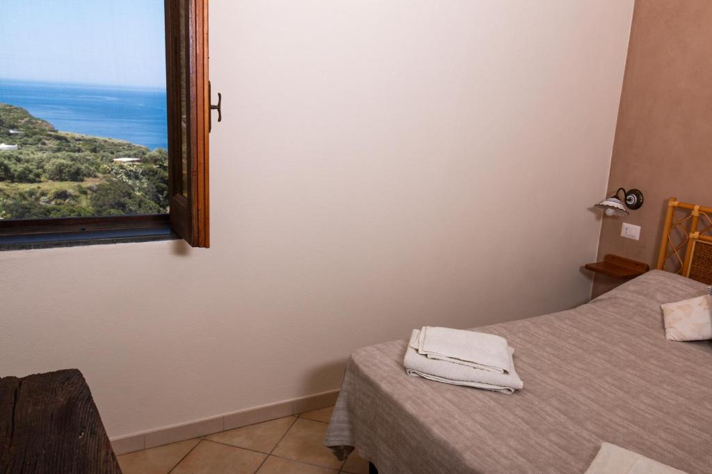 Postel nebo postele na pokoji v ubytování Agriturismo Al Cappero