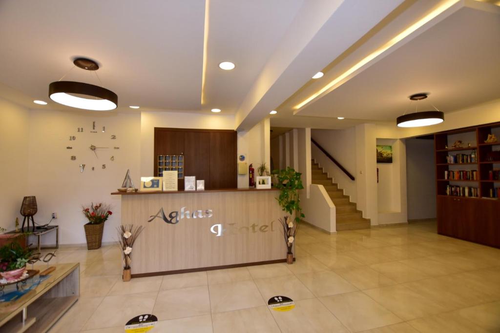a lobby of an office with a reception counter at Hotel Aghas Paleochora in Palaiochora