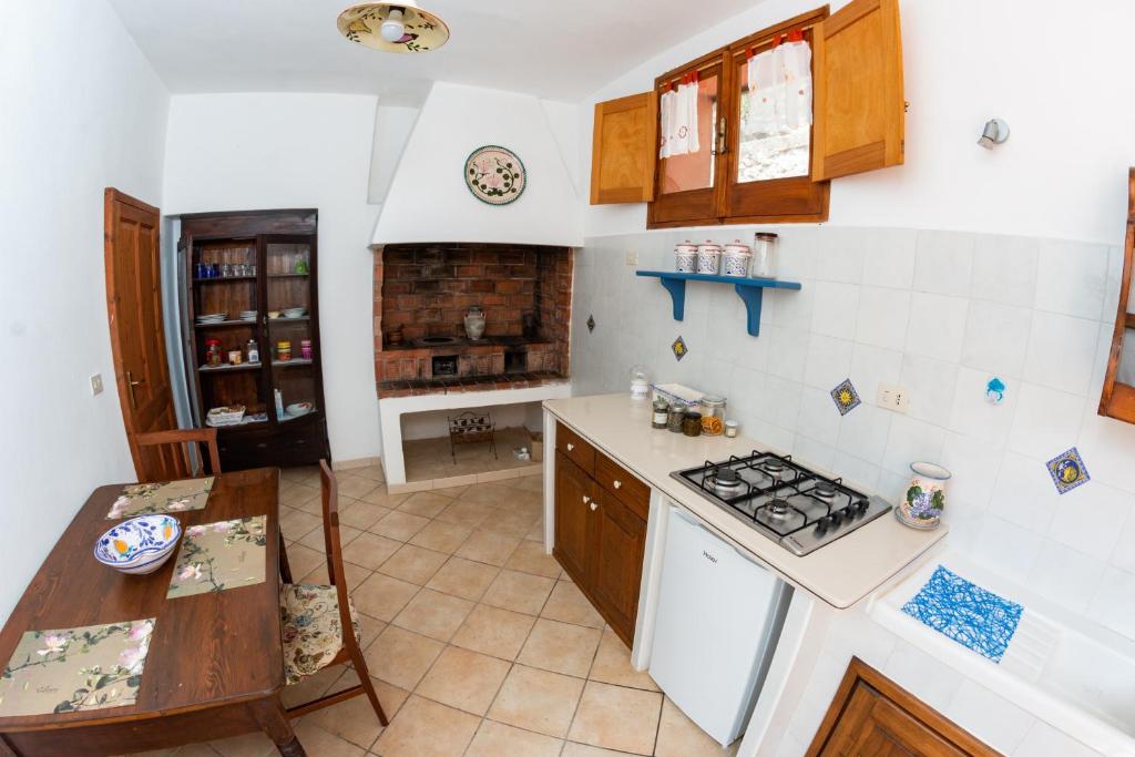 Kuchyň nebo kuchyňský kout v ubytování Agriturismo Al Cappero