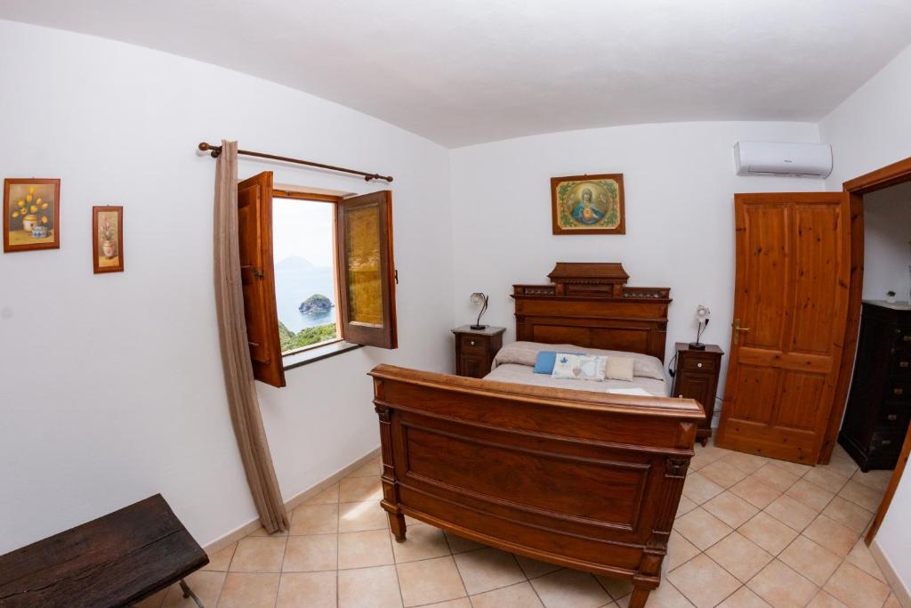Postel nebo postele na pokoji v ubytování Agriturismo Al Cappero