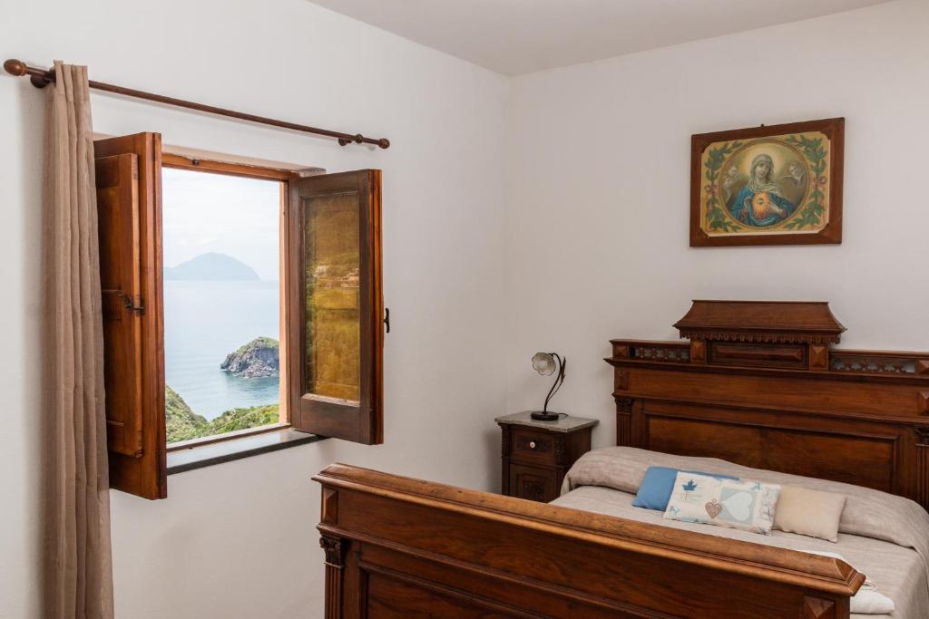 Postel nebo postele na pokoji v ubytování Agriturismo Al Cappero
