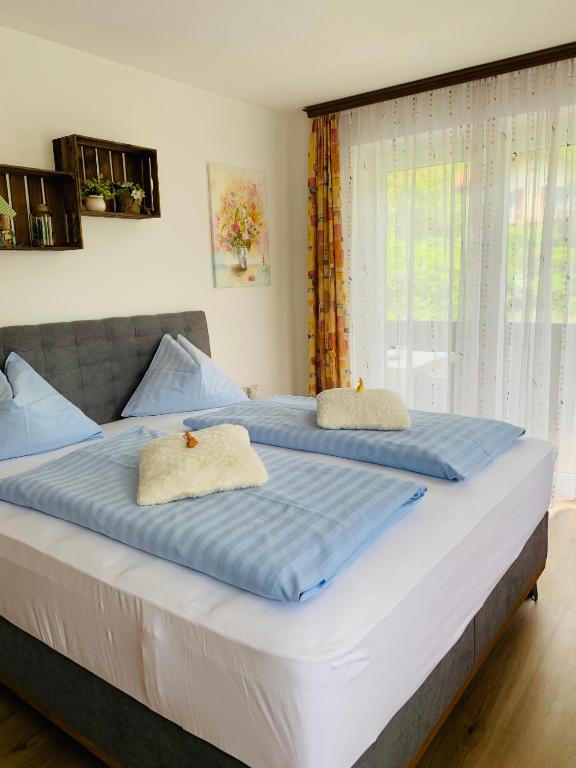 Postel nebo postele na pokoji v ubytování Appartementhaus Sonne