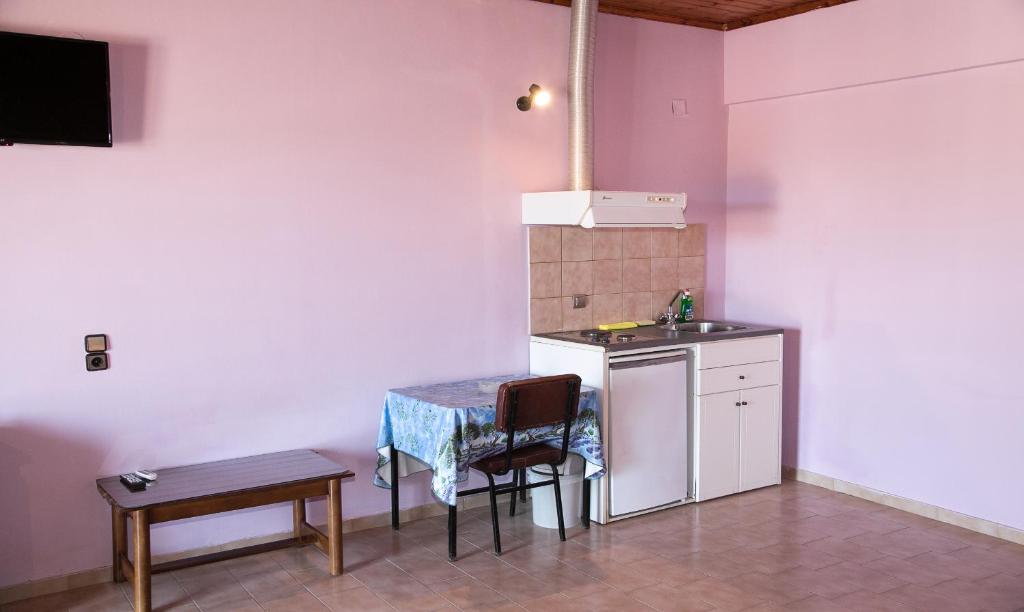 Kuchyň nebo kuchyňský kout v ubytování Petania Hotel & Apartments