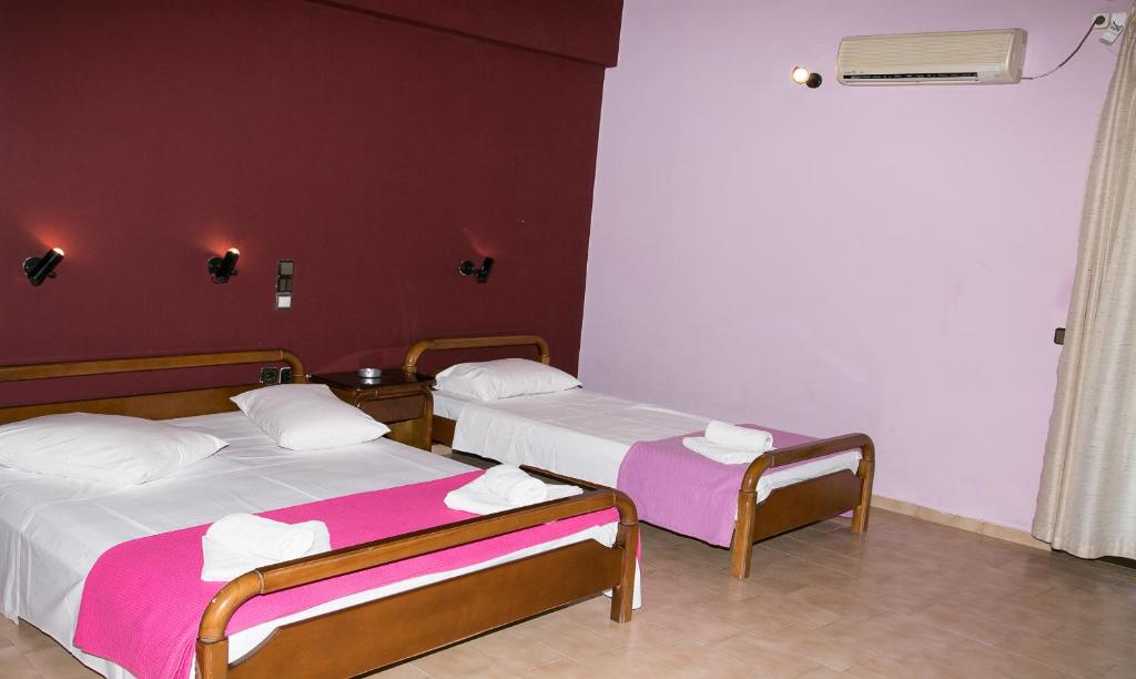 Postel nebo postele na pokoji v ubytování Petania Hotel & Apartments