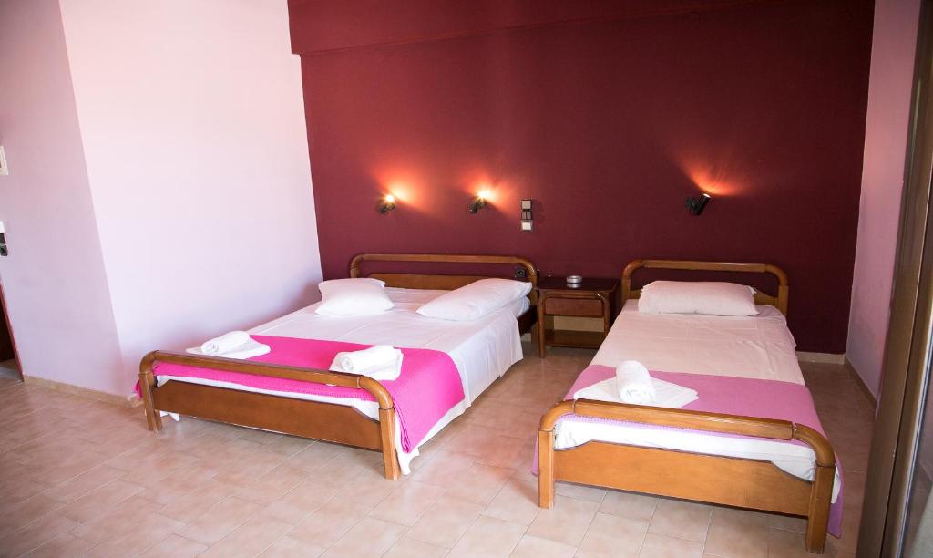 Postel nebo postele na pokoji v ubytování Petania Hotel & Apartments