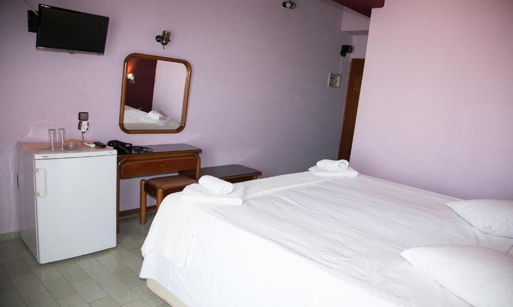 Postel nebo postele na pokoji v ubytování Petania Hotel & Apartments