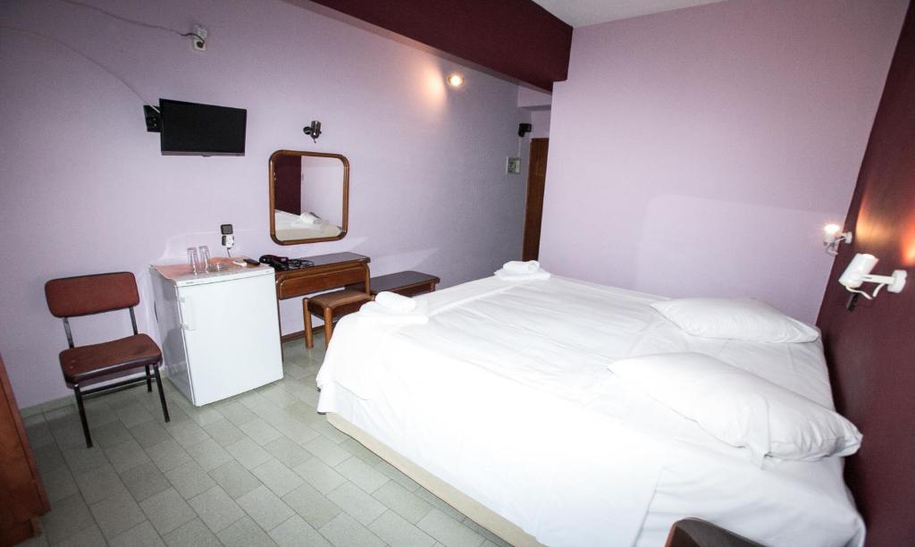 Postel nebo postele na pokoji v ubytování Petania Hotel & Apartments
