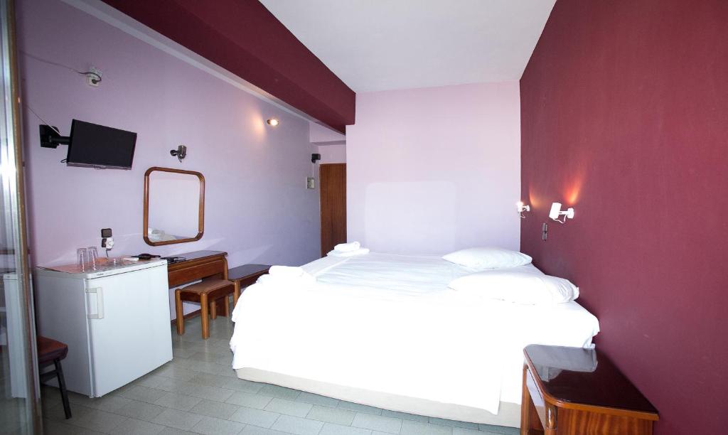 Postel nebo postele na pokoji v ubytování Petania Hotel & Apartments