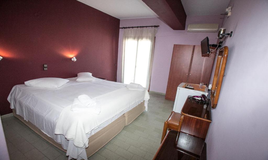 Postel nebo postele na pokoji v ubytování Petania Hotel & Apartments