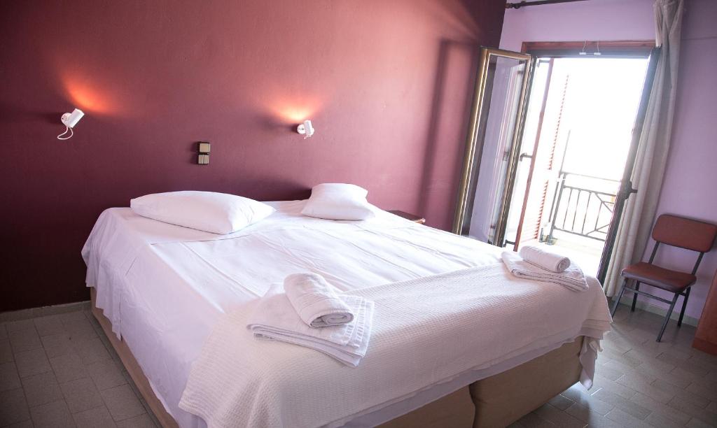 Postel nebo postele na pokoji v ubytování Petania Hotel & Apartments