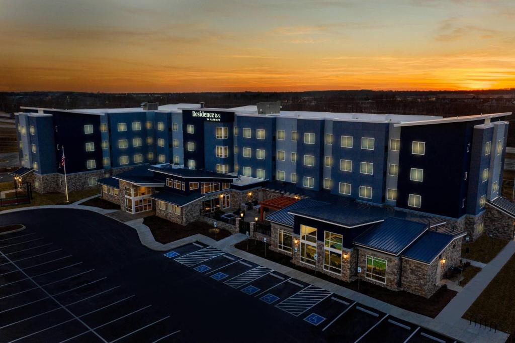 an aerial view of a hotel at sunset at Residence Inn by Marriott Louisville Old Henry in Louisville