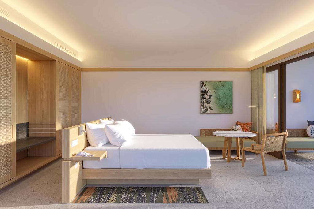 Postel nebo postele na pokoji v ubytování Sheraton Belitung Resort