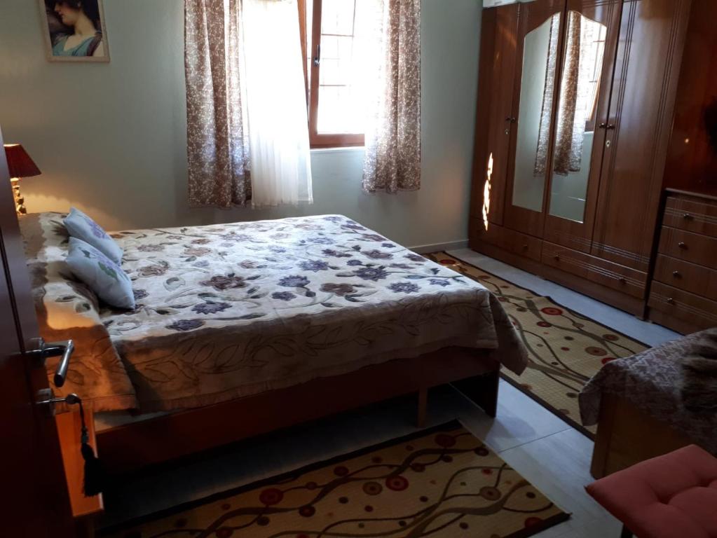 Postel nebo postele na pokoji v ubytování Vila Topalli