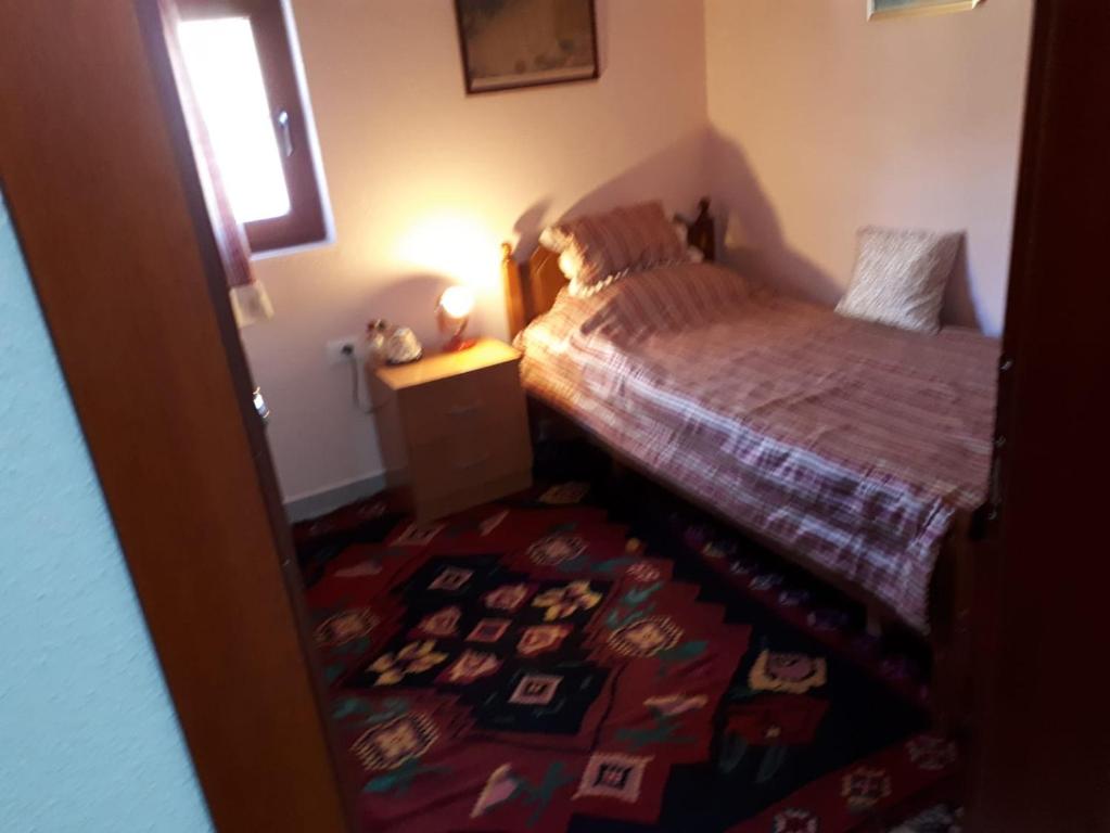 Postel nebo postele na pokoji v ubytování Vila Topalli