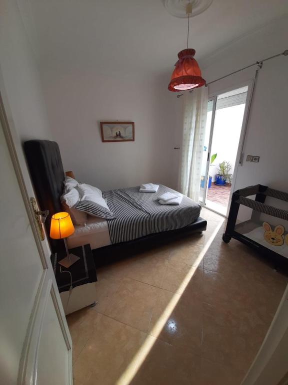Postel nebo postele na pokoji v ubytování Maison Belle Dune