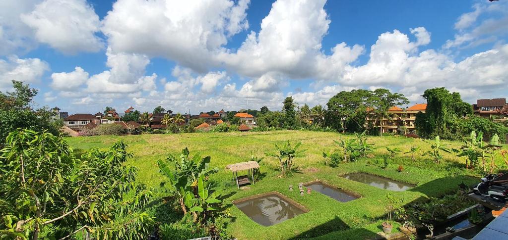Zahrada ubytování Kun - Kun Guest House Ubud