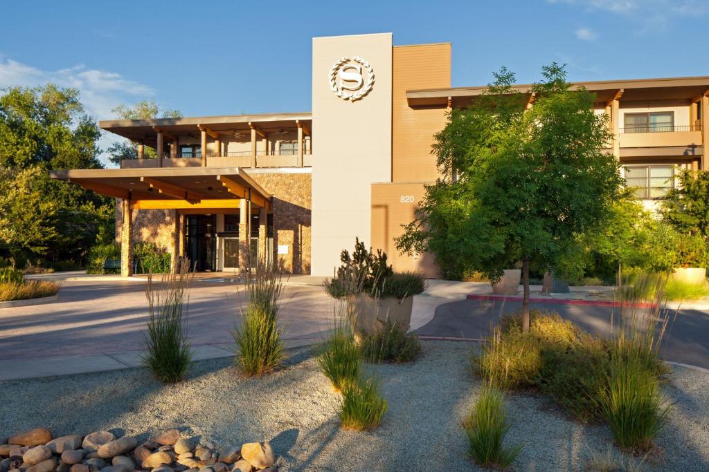 a building with a clock on the side of it at Sheraton Redding Hotel at the Sundial Bridge in Redding