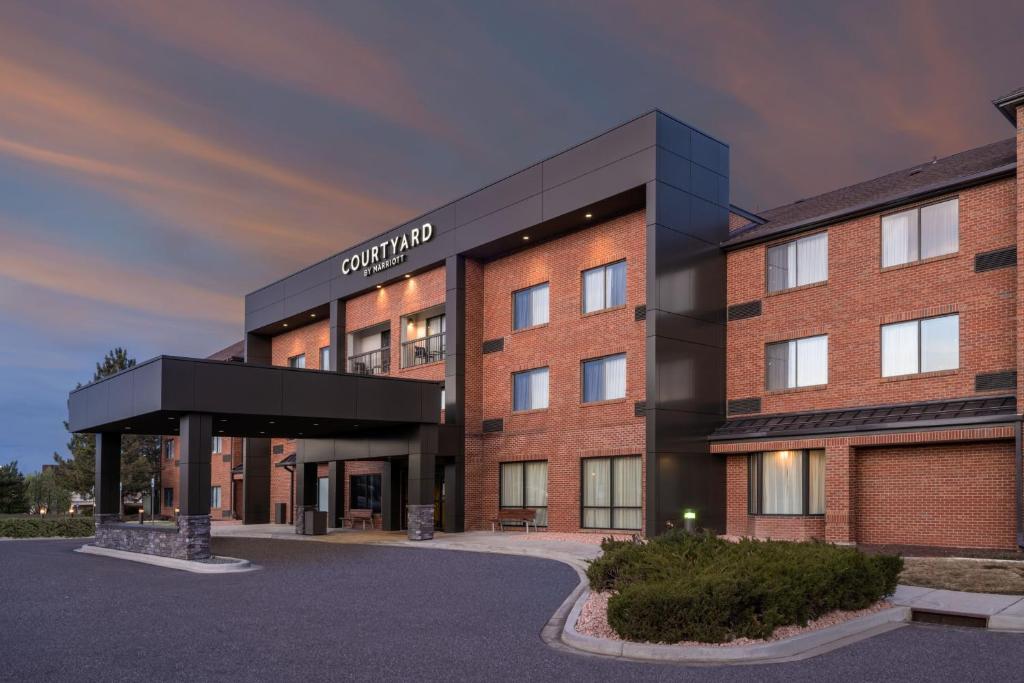 a rendering of the front of a building at Courtyard by Marriott Boulder Broomfield in Louisville
