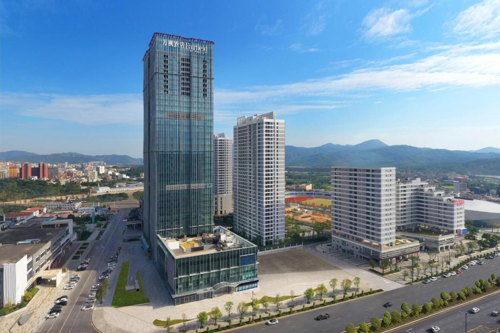 an aerial view of a city with tall buildings at Fairfield by Marriott Shenshan Special Cooperation Zone in Haifeng