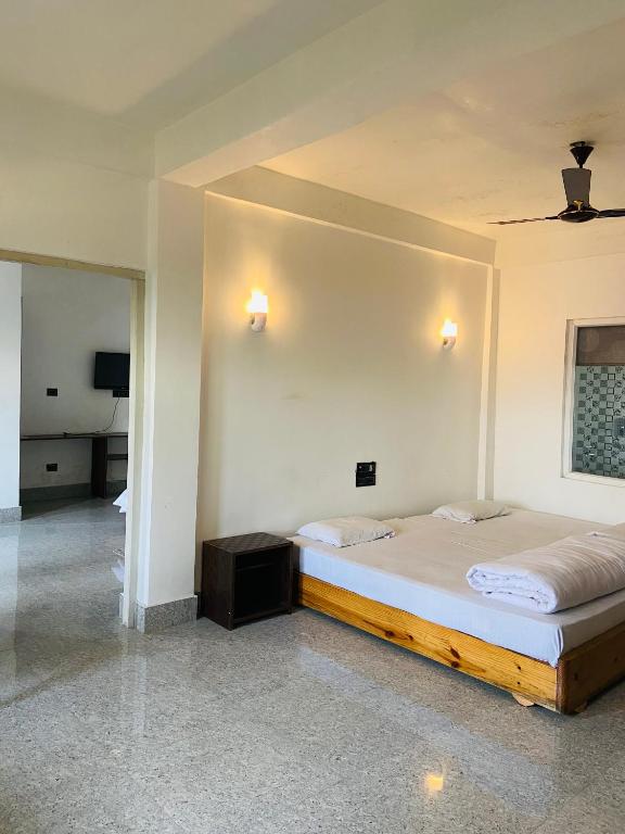 Postel nebo postele na pokoji v ubytování Hidden Gem Residency