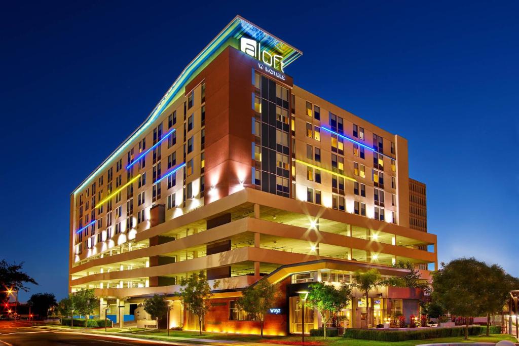 a building with a hotel sign on top of it at Aloft Houston by the Galleria in Houston