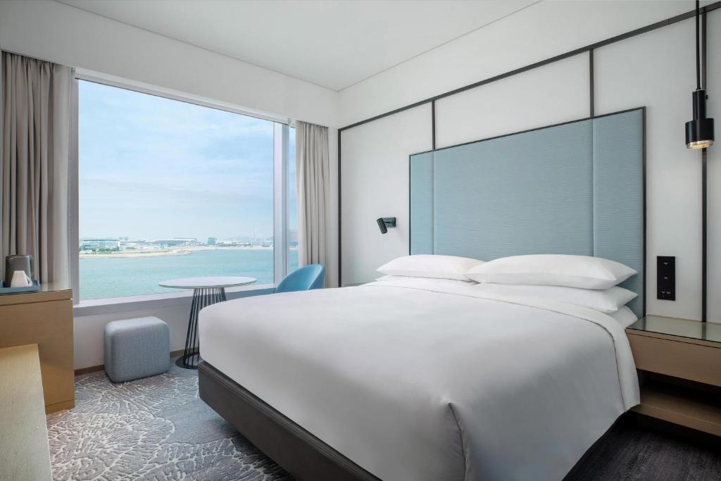 Krevet ili kreveti u jedinici u okviru objekta Four Points by Sheraton Hong Kong, Tung Chung