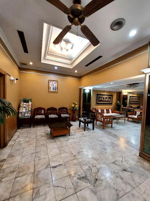 Posezení v ubytování Traveller Inn Hotel