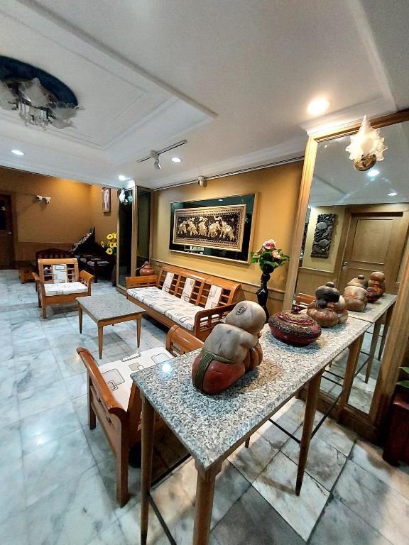 Posezení v ubytování Traveller Inn Hotel