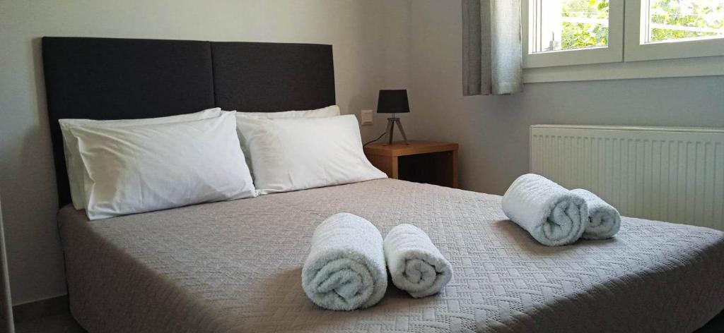 Postel nebo postele na pokoji v ubytování Spiridoula Luxury Villa