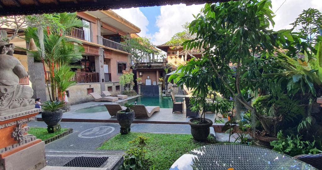Zahrada ubytování Kun - Kun Guest House Ubud