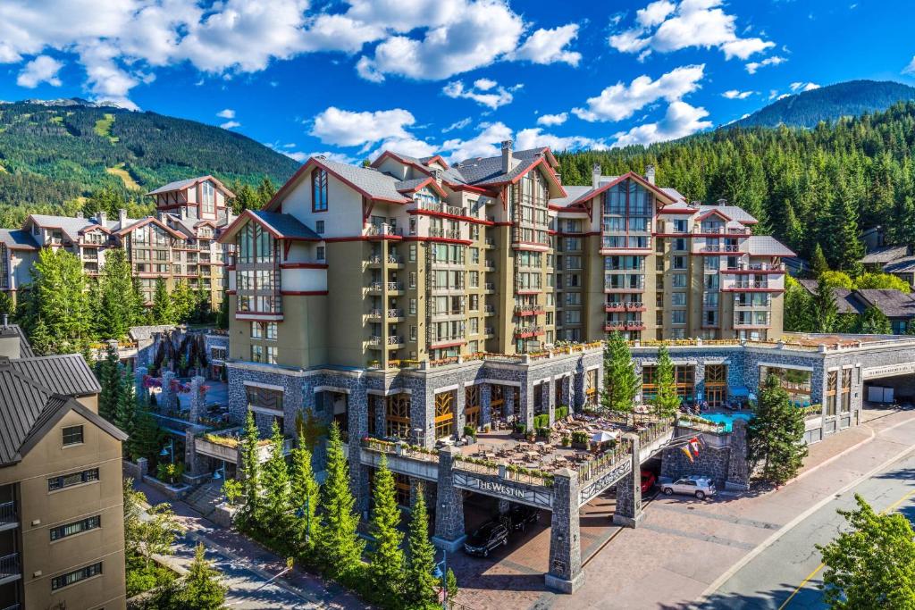 an aerial view of a resort in the mountains at The Westin Resort & Spa, Whistler in Whistler