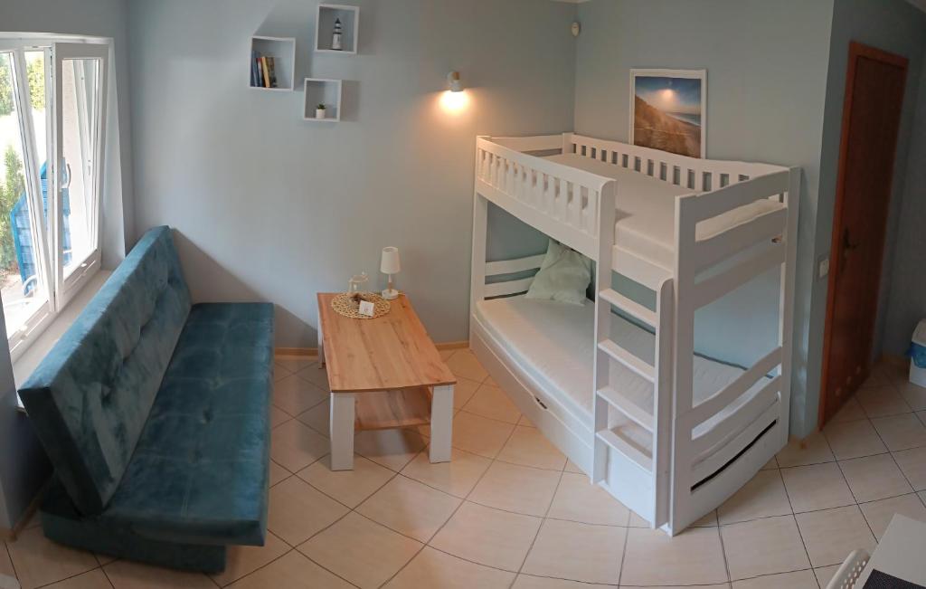 Postel nebo postele na pokoji v ubytování ALOHA Rowy