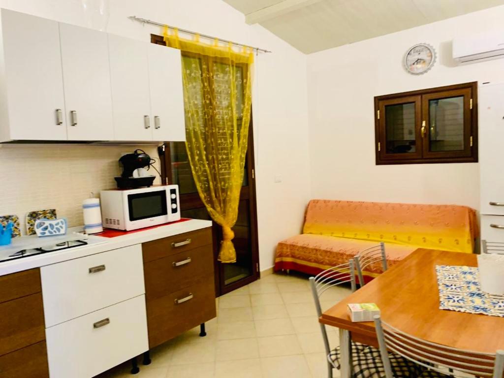 Kuchyň nebo kuchyňský kout v ubytování Casa Lucinzina